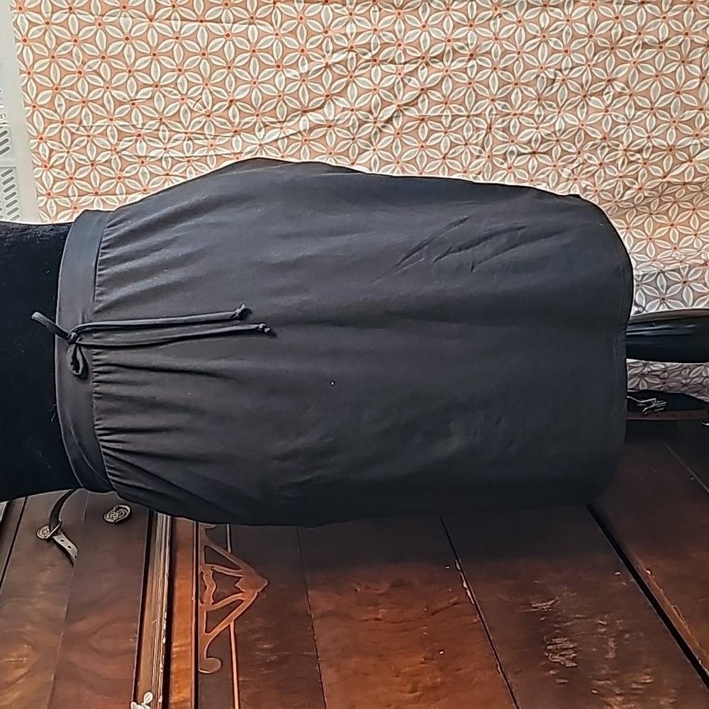 Stretch Is Comfort black skirt with pockets